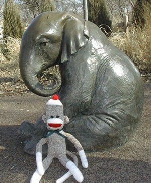 sock monkey by statue